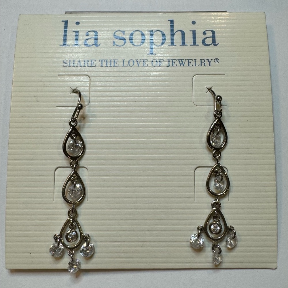 Lia Sophia dangle Piroutte pierced earrings. Silver with clear cut crystals.